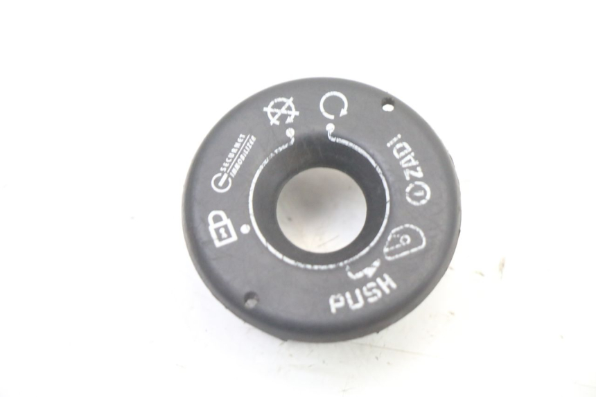 photo de COPERCHIO BLOCCHETTO ACCENSIONE GILERA NEXUS 300 (2008 - 2013)