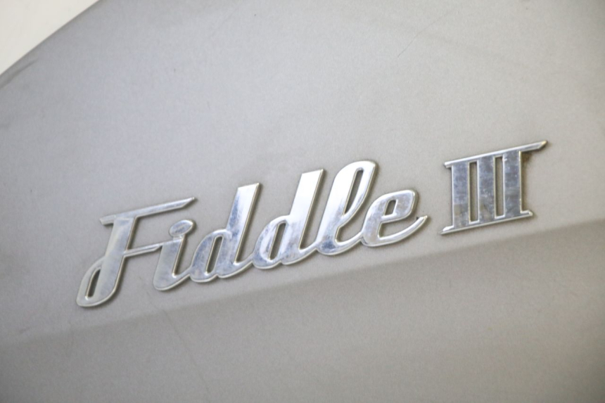 photo de PARAFANGO POSTERIORE DESTRO SYM FIDDLE 3 III 125 (2014 - 2020) - Altra angolazione